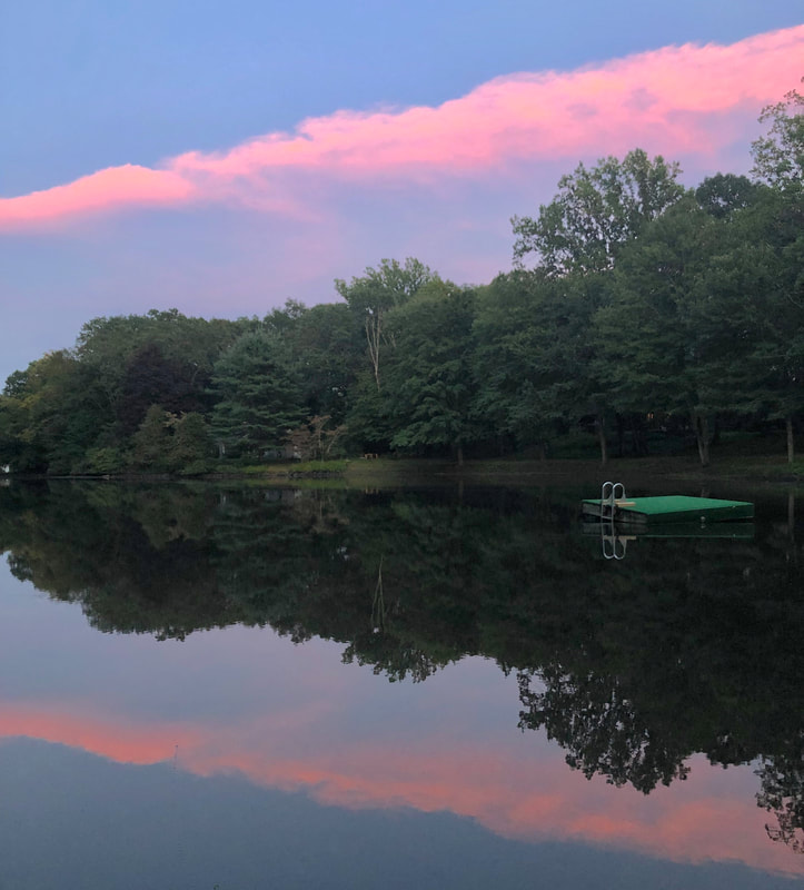 Pink sunset over Button Mill Pond in Easton, Connecticut